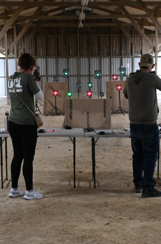 Two people using target range